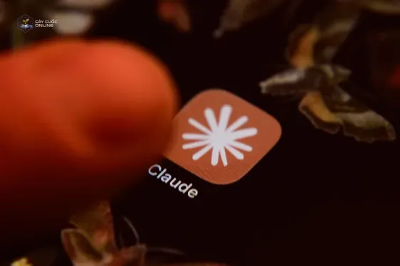 The Claude app icon is displayed on a smartphone screen
